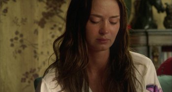 Movie still from “My Summer of Love” (2004), directed by Pawel Pawlikowski – A beautiful woman with long brown wavy hair; Close Up shot, Over the shoulder angle