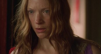 Movie still from “My Summer of Love” (2004), directed by Pawel Pawlikowski – A person with long red hair; Close Up shot, Over the shoulder angle