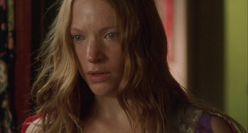 Movie still from “My Summer of Love” (2004), directed by Pawel Pawlikowski – A person with long blonde hair; Close Up shot, Over the shoulder angle