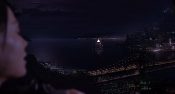 Movie still from “Mystery Men” (1999), directed by Kinka Usher – A night view of the ocean and a bridge; Extreme Wide shot, High angle