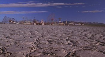 Movie still from “Mystery Men” (1999), directed by Kinka Usher – A view of an amusement park from the ground; Extreme Wide shot, High angle