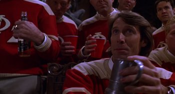 Movie still from “Mystery Men” (1999), directed by Kinka Usher – A group of men standing next to each other holding cups; Close Up shot, Low angle