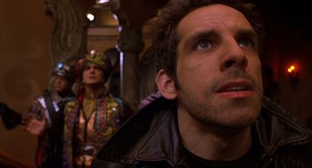 Movie still from “Mystery Men” (1999), directed by Kinka Usher – A person wearing a leather jacket; Close Up shot, Low angle