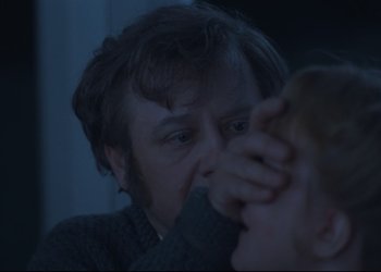 Movie still from “A Few Days from the Life of I.I. Oblomov” (1980), directed by Nikita Mikhalkov – A man is looking at his reflection in a mirror; Close Up shot, Over the shoulder angle