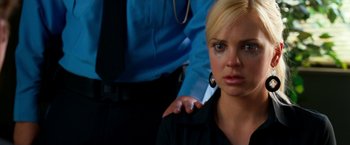 Movie still from “Observe and Report” (2009), directed by Jody Hill – A woman sitting in front of another woman; Close Up shot, Over the shoulder angle