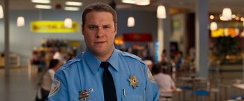 Movie still from “Observe and Report” (2009), directed by Jody Hill – A man in a police officer's uniform; Close Up shot, Over the shoulder angle