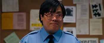 Movie still from “Observe and Report” (2009), directed by Jody Hill – A man in a blue shirt and tie; Close Up shot, Low angle