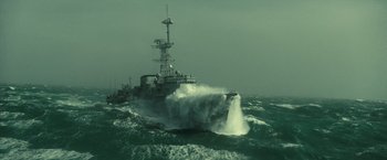 Movie still from “Oceans” (2009), directed by Jacques Cluzaud – A large boat in the middle of the ocean; Extreme Wide shot, Low angle