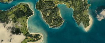 Movie still from “Oceans” (2009), directed by Jacques Cluzaud – An aerial view of a body of water; Extreme Wide shot, Overhead angle