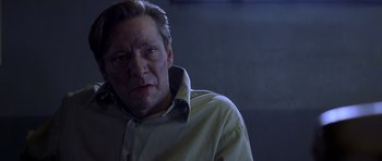 Movie still from “October Sky” (1999), directed by Joe Johnston – A person wearing a white shirt; Close Up shot, Over the shoulder angle