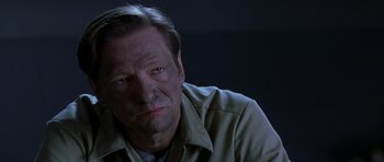 Movie still from “October Sky” (1999), directed by Joe Johnston – A person wearing a jacket; Close Up shot, High angle