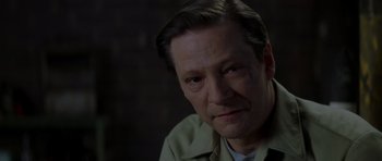 Movie still from “October Sky” (1999), directed by Joe Johnston – A person wearing a shirt; Close Up shot, Over the shoulder angle