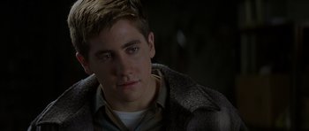 Movie still from “October Sky” (1999), directed by Joe Johnston – A person wearing a jacket; Close Up shot, Over the shoulder angle