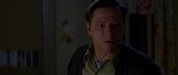 Movie still from “October Sky” (1999), directed by Joe Johnston – A person wearing a shirt; Close Up shot, Over the shoulder angle