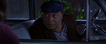 Movie still from “October Sky” (1999), directed by Joe Johnston – A person wearing a hat; Close Up shot, Over the shoulder angle