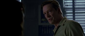 Movie still from “October Sky” (1999), directed by Joe Johnston – A person wearing a white shirt; Close Up shot, Over the shoulder angle