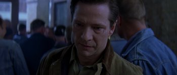 Movie still from “October Sky” (1999), directed by Joe Johnston – A person wearing a jacket; Close Up shot, Over the shoulder angle