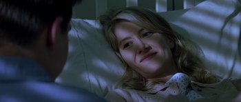 Movie still from “October Sky” (1999), directed by Joe Johnston – A person laying in a bed; Close Up shot, Over the shoulder angle