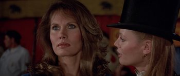 Movie still from “Octopussy” (1983), directed by John Glen – Two women are looking at each other in a room; Close Up shot, Over the shoulder angle