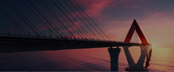Movie still from “Office Christmas Party” (2016), directed by Will Speck – A view of a bridge that is over a body of water at sunset; Extreme Wide shot, Low angle