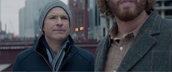 Movie still from “Office Christmas Party” (2016), directed by Will Speck – Two men standing next to each other on the street; Close Up shot, Over the shoulder angle