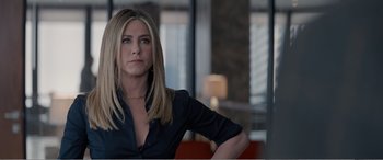 Movie still from “Office Christmas Party” (2016), directed by Will Speck – Jennifer aniston in a scene from the movie cake; Close Up shot, Over the shoulder angle
