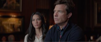 Movie still from “Office Christmas Party” (2016), directed by Will Speck – A man and a woman sitting next to each other; Close Up shot, Over the shoulder angle