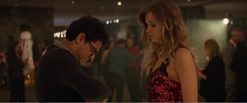Movie still from “Office Christmas Party” (2016), directed by Will Speck – A man and a woman are dancing in a room; Medium shot, Low angle