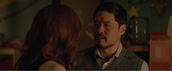 Movie still from “Office Christmas Party” (2016), directed by Will Speck – A man and a woman are looking at each other; Close Up shot, Over the shoulder angle