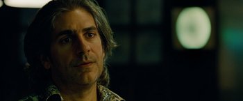 Movie still from “Oldboy” (2013), directed by Spike Lee – A person with long grey hair; Close Up shot, Over the shoulder angle