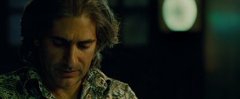 Movie still from “Oldboy” (2013), directed by Spike Lee – A person with long hair; Close Up shot, Over the shoulder angle
