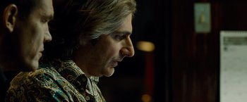 Movie still from “Oldboy” (2013), directed by Spike Lee – A person with long hair; Close Up shot, Over the shoulder angle