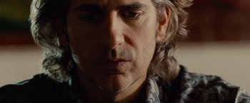 Movie still from “Oldboy” (2013), directed by Spike Lee – A person with long white hair; Close Up shot, Low angle