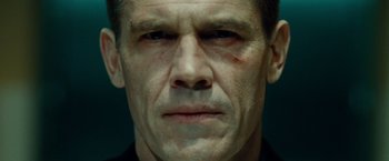 Movie still from “Oldboy” (2013), directed by Spike Lee – A person with a bruise on his face; Close Up shot, Low angle