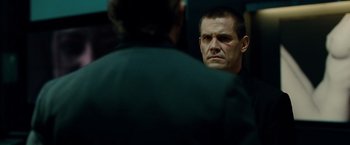 Movie still from “Oldboy” (2013), directed by Spike Lee – A man looking at himself in the mirror; Close Up shot, Over the shoulder angle