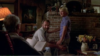 Movie still from “On Golden Pond” (1981), directed by Mark Rydell – A man and a boy in a living room; Medium shot, Over the shoulder angle