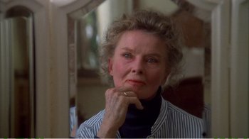 Movie still from “On Golden Pond” (1981), directed by Mark Rydell – An older woman is sitting in front of a mirror; Close Up shot, Over the shoulder angle
