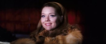 Movie still from “On Her Majesty's Secret Service” (1969), directed by Peter R. Hunt – A person wearing a fur coat; Close Up shot, Low angle