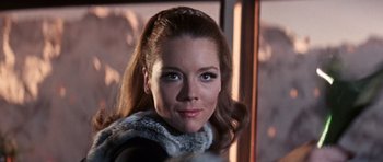 Movie still from “On Her Majesty's Secret Service” (1969), directed by Peter R. Hunt – A person wearing a scarf; Close Up shot, Low angle