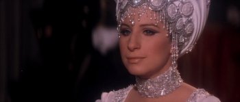 Movie still from “On a Clear Day You Can See Forever” (1970), directed by Vincente Minnelli – A person wearing a costume; Close Up shot, Over the shoulder angle