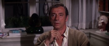 Movie still from “On a Clear Day You Can See Forever” (1970), directed by Vincente Minnelli – A person with his hand under his chin; Close Up shot, Low angle