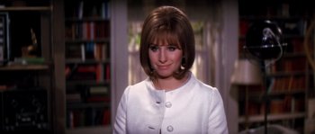 Movie still from “On a Clear Day You Can See Forever” (1970), directed by Vincente Minnelli – A person wearing a suit and tie; Close Up shot, Over the shoulder angle