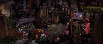 Movie still from “On a Clear Day You Can See Forever” (1970), directed by Vincente Minnelli – A room filled with lots of plants and flowers; Extreme Wide shot, High angle