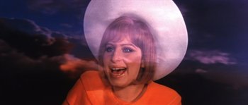 Movie still from “On a Clear Day You Can See Forever” (1970), directed by Vincente Minnelli – A person wearing a hat; Close Up shot, High angle