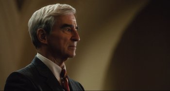 Movie still from “On the Basis of Sex” (2018), directed by Mimi Leder – An older man wearing a suit and tie; Close Up shot, Low angle