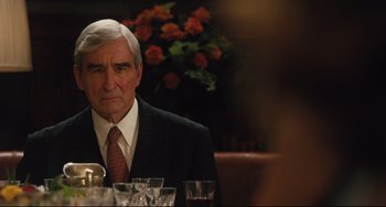 Movie still from “On the Basis of Sex” (2018), directed by Mimi Leder – An older man sitting at a dinner table; Close Up shot, Over the shoulder angle