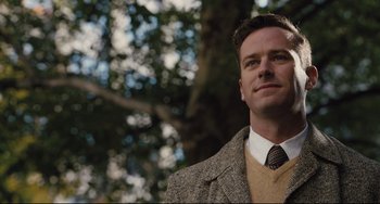 Movie still from “On the Basis of Sex” (2018), directed by Mimi Leder – A person wearing a suit and tie; Close Up shot, Low angle