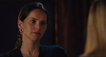 Movie still from “On the Basis of Sex” (2018), directed by Mimi Leder – A person wearing a blue shirt; Close Up shot, Over the shoulder angle