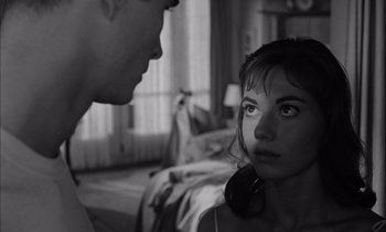 Movie still from “On the Beach” (1959), directed by Stanley Kramer – A man and a woman in a bedroom; Close Up shot, Over the shoulder angle