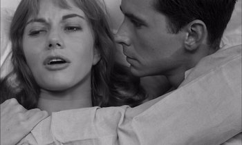Movie still from “On the Beach” (1959), directed by Stanley Kramer – A man and a woman are looking into each others eyes; Close Up shot, Over the shoulder angle